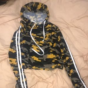 Long sleeve, hooded, crop top.